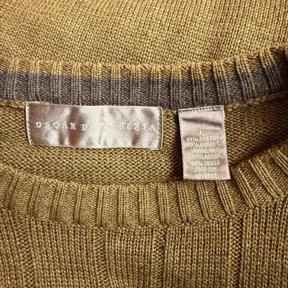 Oscar de la Renta offers sweater structured